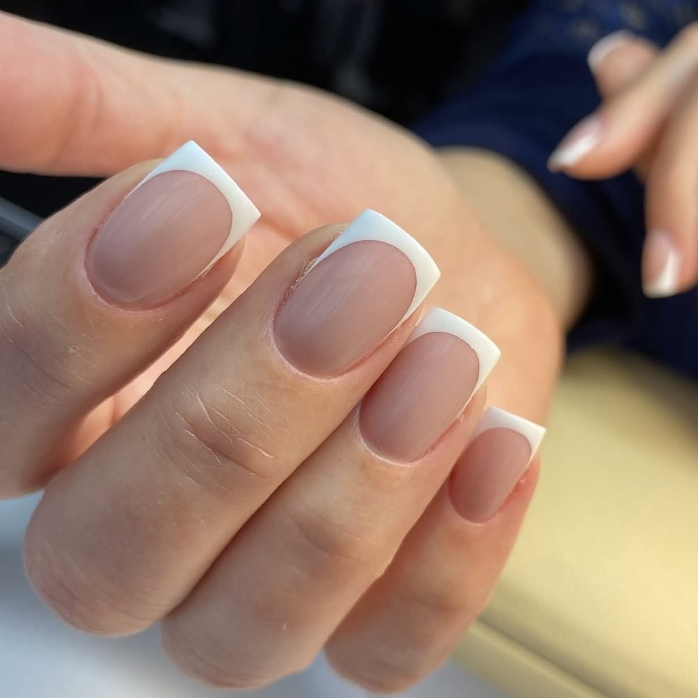 Short square nails with a classic white French tip