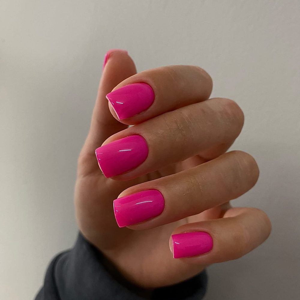 Short square nails in hot pink