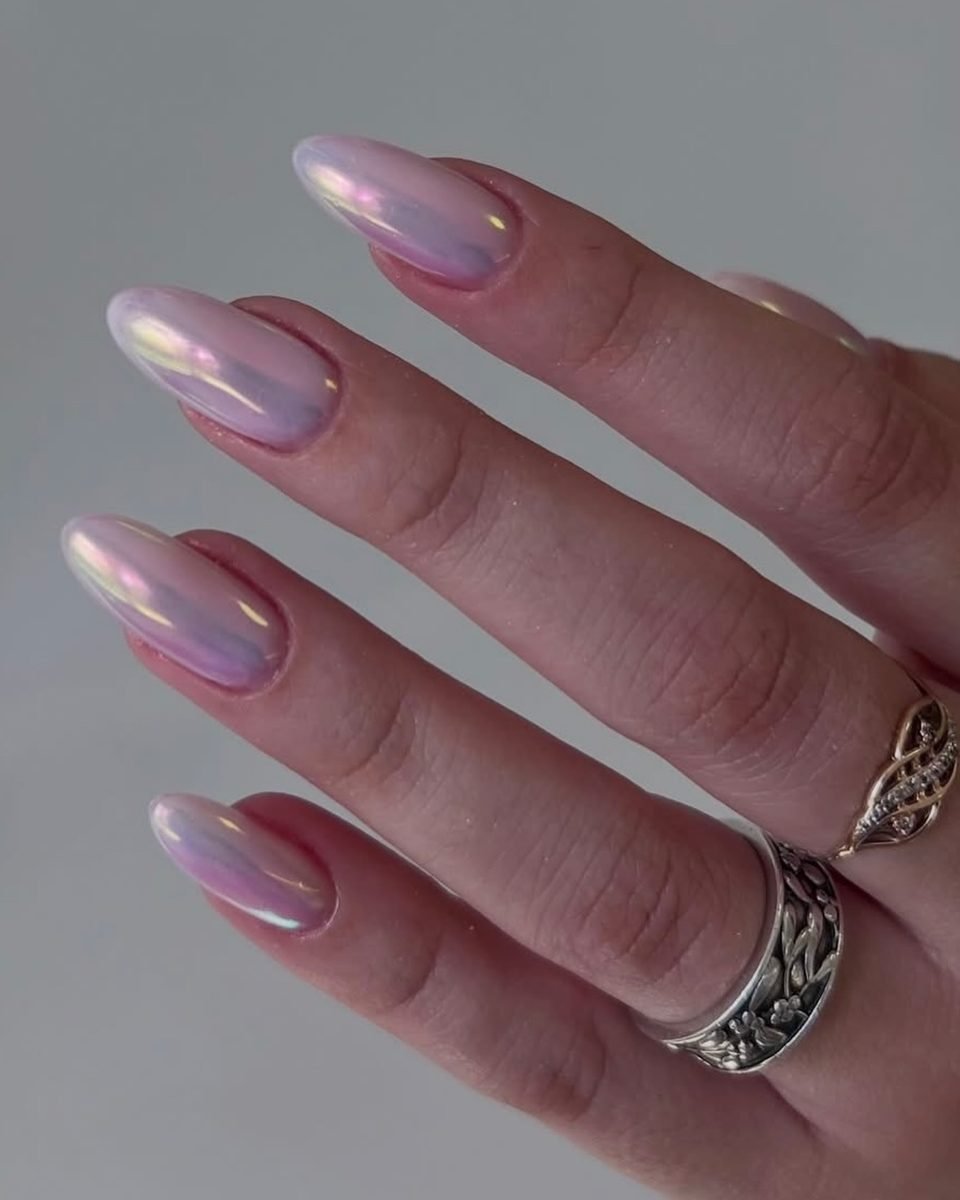 Almond nails with a sheer lilac pearl finish