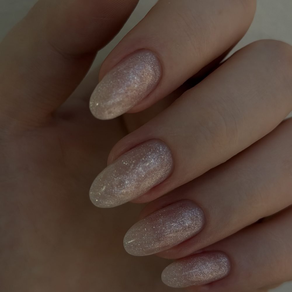 Soft shimmer nude almond nails